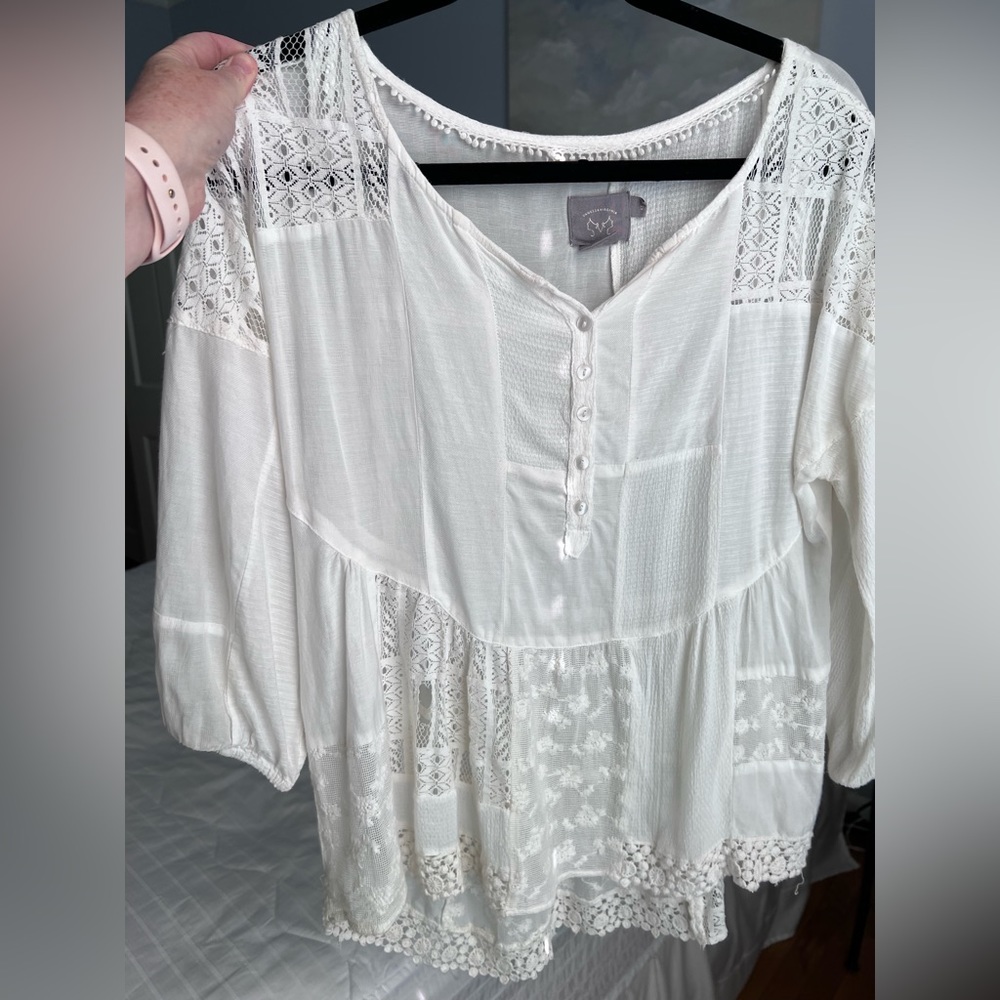 Vanessa Virgina XS white flowy blouse with some lace trim.